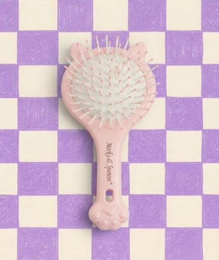 Pink cat hair brush